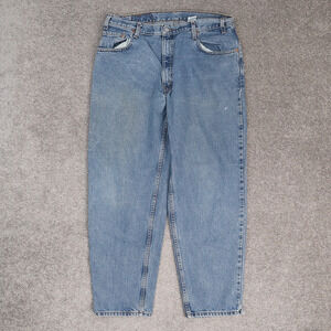 VTG Levi's 560 34x28 Loose Fit Tapered Leg Medium Wash Blue Denim Jeans